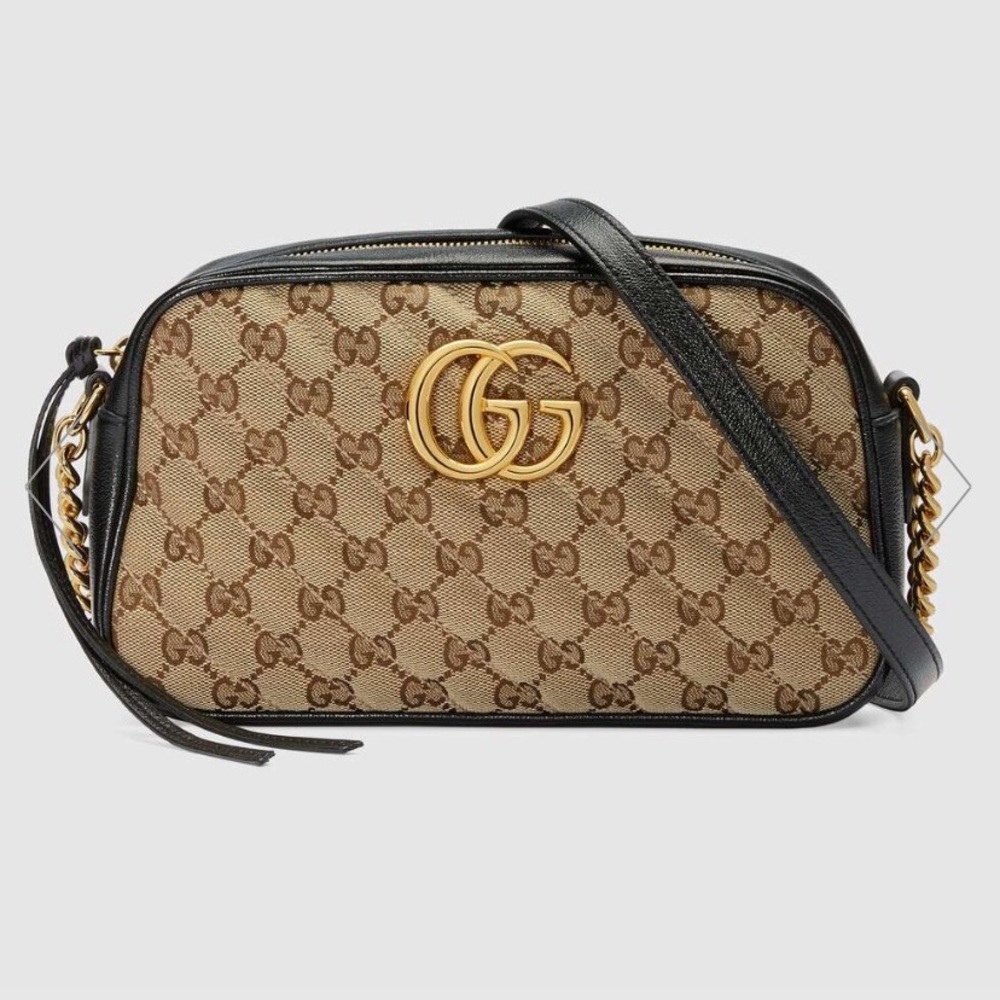 AUTHENTIC GUGGI CROSSBODY BAG . Approx. 9.5" length x 5.5" height x 3" width.